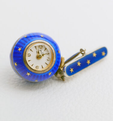 montre broche